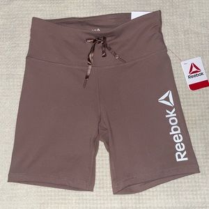 Womans bike shorts. 7” inseam. Back pocket. New with tags